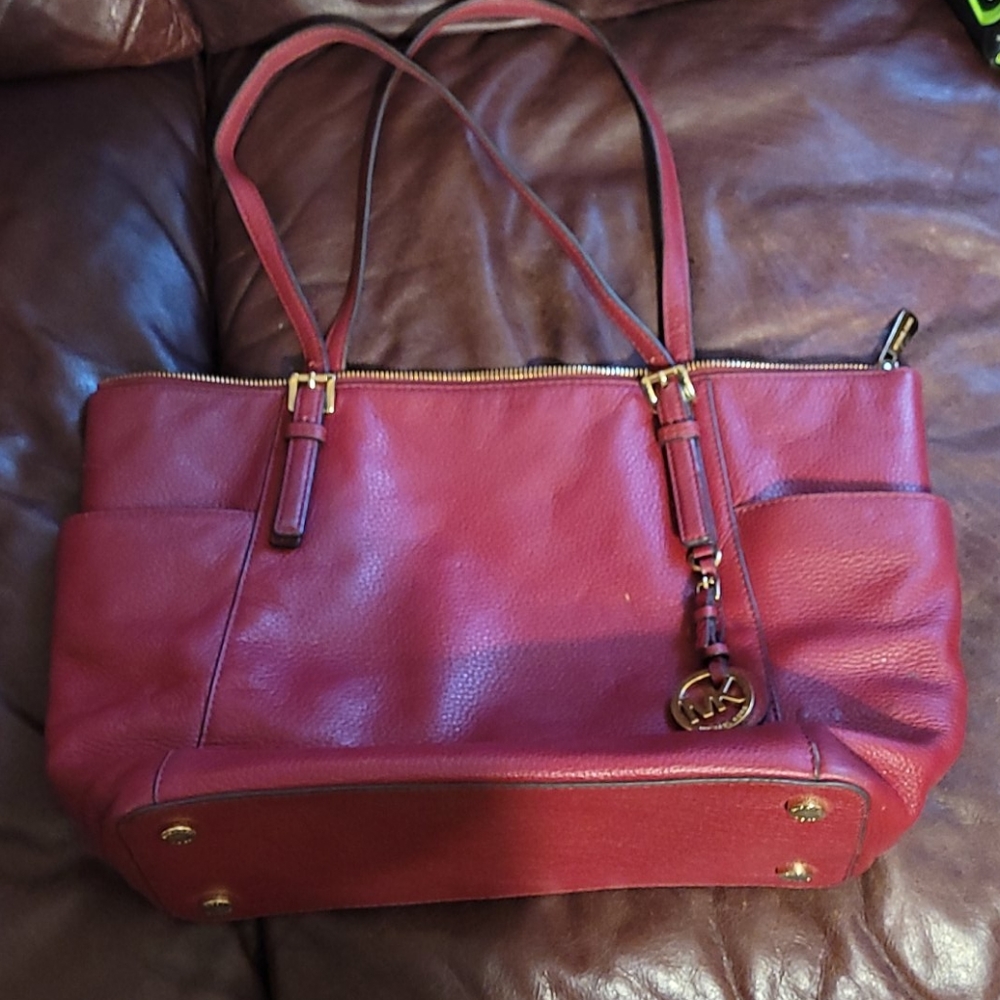 MK red pebble leather shoulder bag